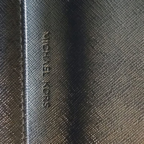 Michael Kors blue leather clutch bag like new with silver clasp