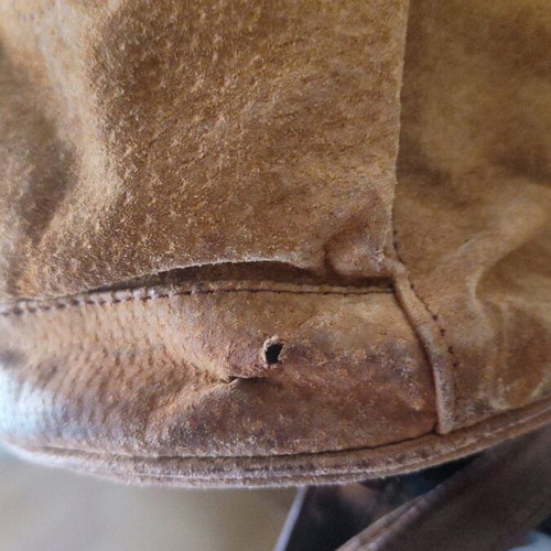 Handmade leather backpack used with adjustable straps