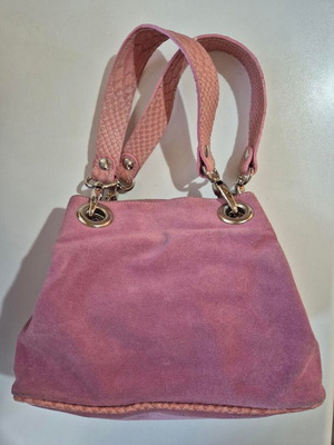 Pink castor hand bag used