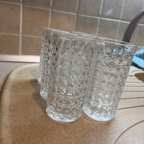 Water glasses set of 5 like new with embossed design