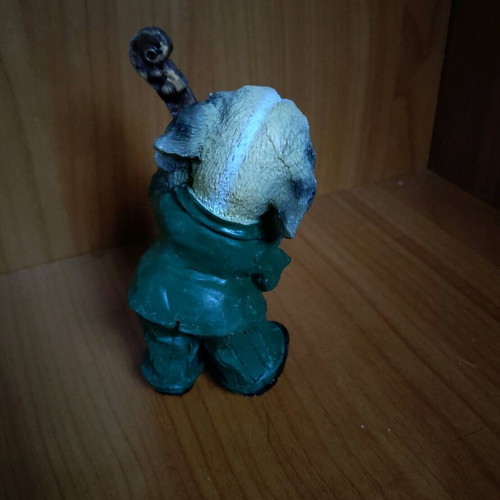 Decorative dog figure with cello like new
