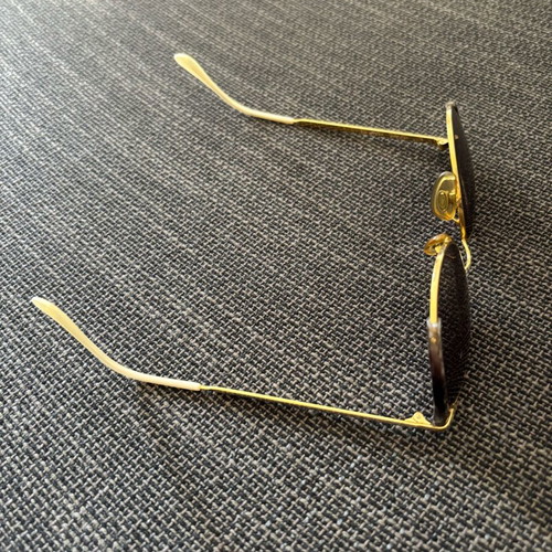 Vogart vintage sunglasses used with gold frame and silver details