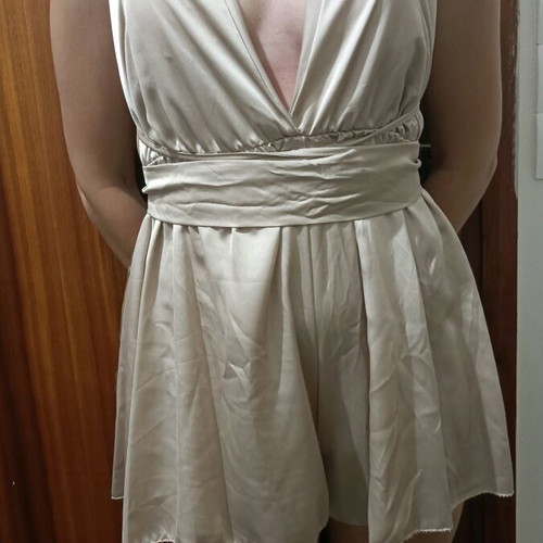 One-piece mini romper like new, gold with crisscross back