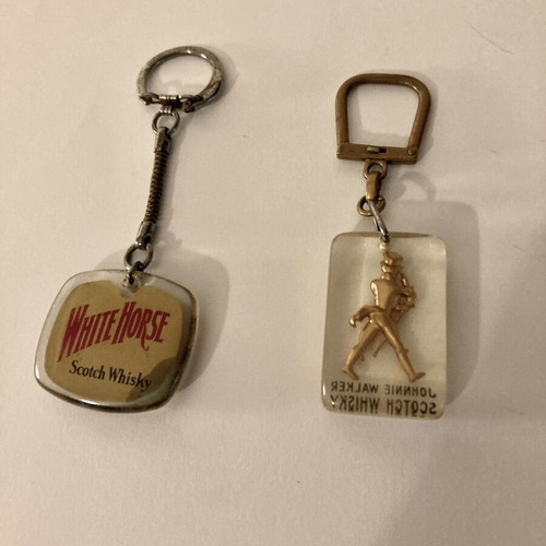 Keychains 2 collectible used Johnnie Walker and White Horse