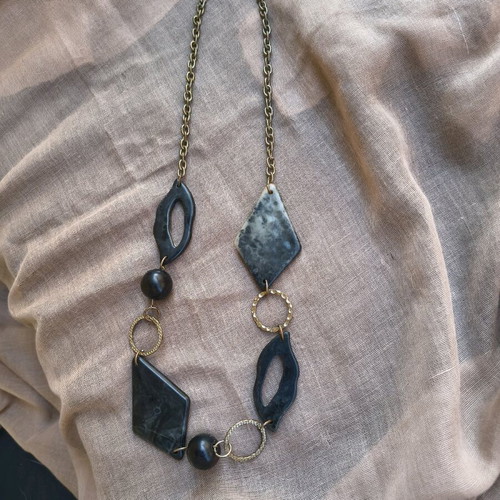Necklace with black elements like new, modern statement jewelry