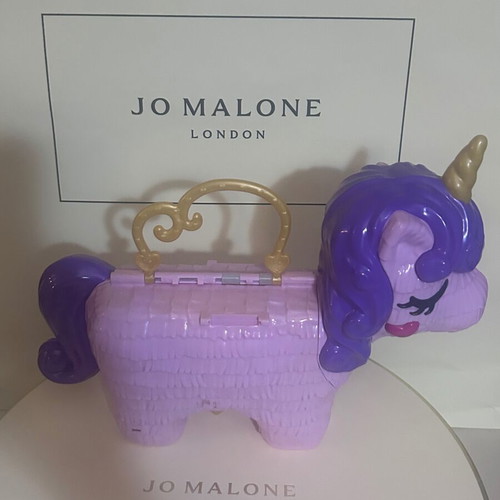 Polly Pocket Unicorn Party Playset used by Mattel
