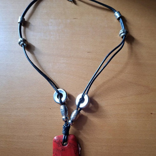 Women's necklace with red stone pendant and silver accessories like new
