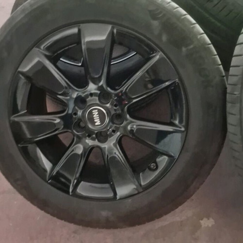Mini 225 55 17 tires and rims like new, genuine black wheels