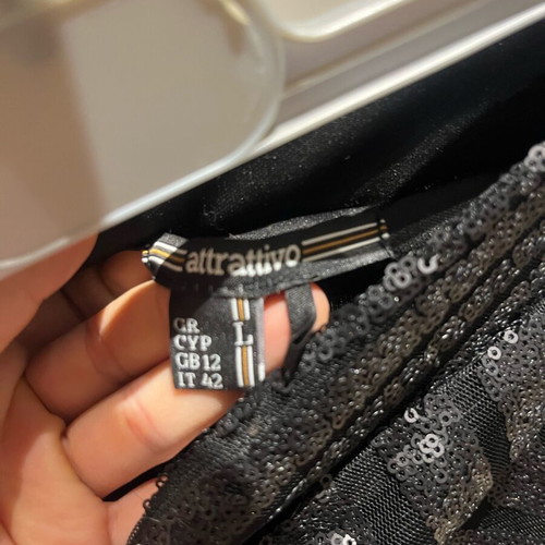 Mini skirt with sequins Attrattivo black, like new