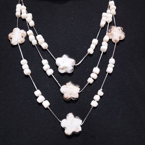 Necklace with triple strand glass flowers and beads new