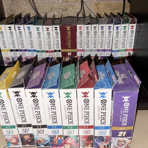 One Piece Card Game full collection with starter decks and rare cards