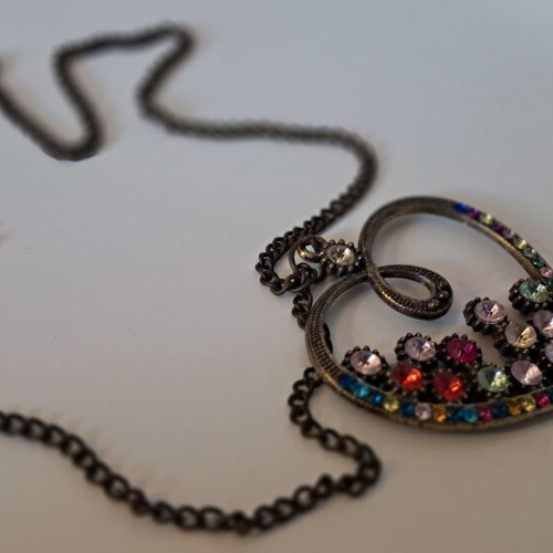 Vintage heart pendant necklace with colorful rhinestones used