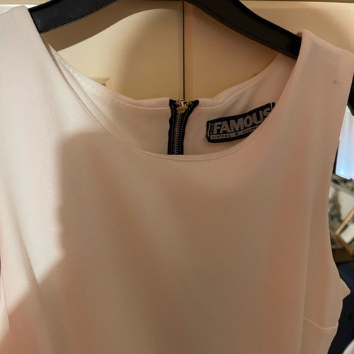 Famous dress size small like new, white and multicolor
