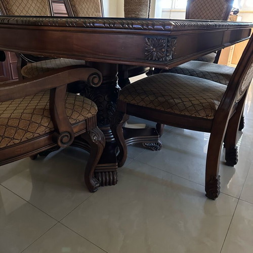 Classic wooden dining set with six chairs used