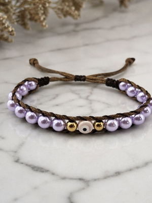 Handmade bracelet with lilac pearls and ceramic evil eye, like new