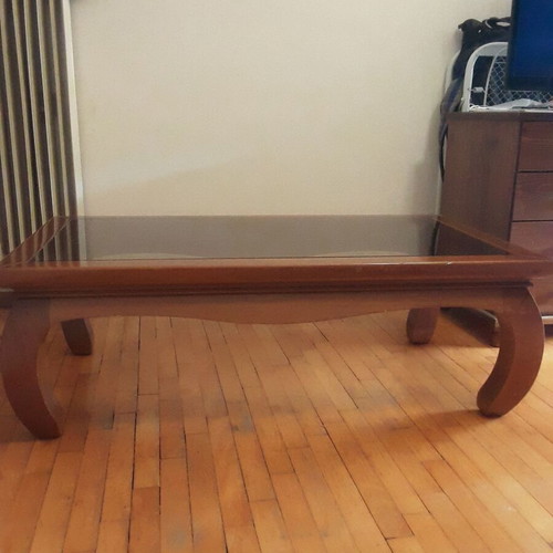 Solid wood coffee table with glass