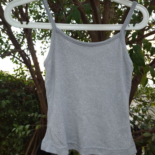 Silver blouse used, size Small, elastic fabric