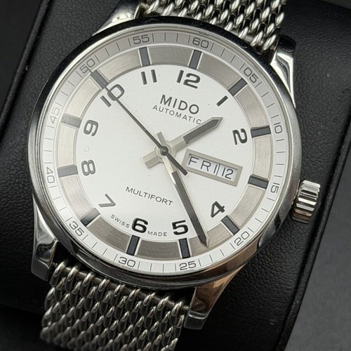 Mido automatic men's watch like new, silver color with box and strap