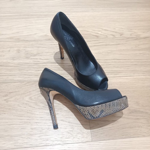 Peep toe heels used, leather with animal print platform