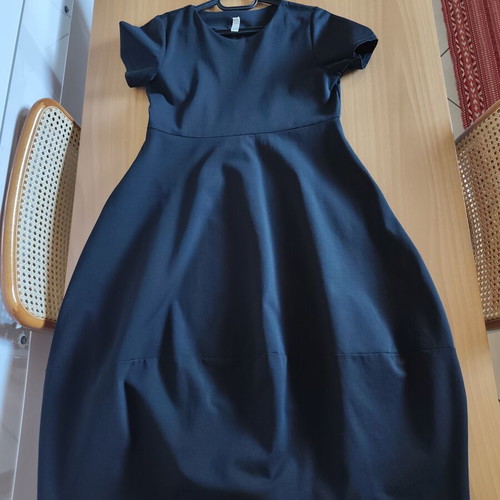 Black midi dress with pockets and asymmetrical design, one size