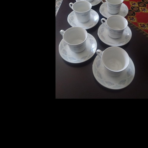 Porcelain tea cups with saucers set of 7, new