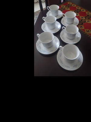 Porcelain tea cups with saucers set of 7, new