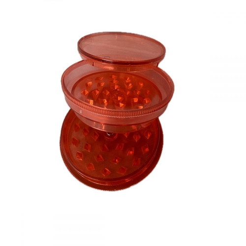 Plastic tobacco and herb grinder red, new, 60x25mm