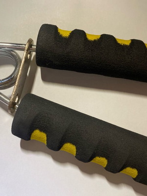 Fitness hand gripper like new, yellow and black