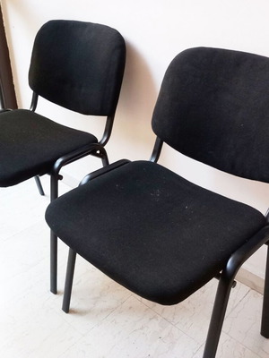 Visitor chairs used, simple black, set of two with metal frame