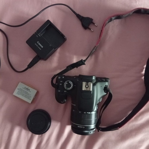 Canon EOS600D camera with 18-55mm lens, strap, charger, and two batteries