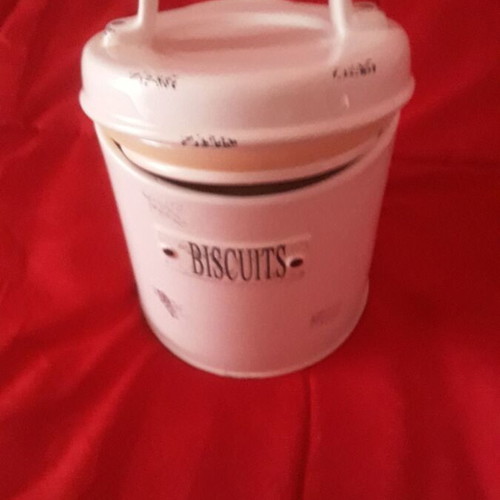 Vintage biscuit tin in the shape of a heart