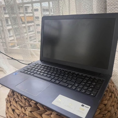 Asus laptop used, Intel Celeron, 8GB RAM, Windows 10