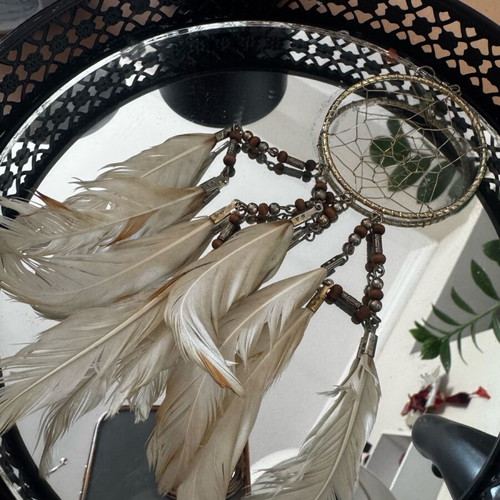 Dreamcatcher earring used with beige and brown feathers