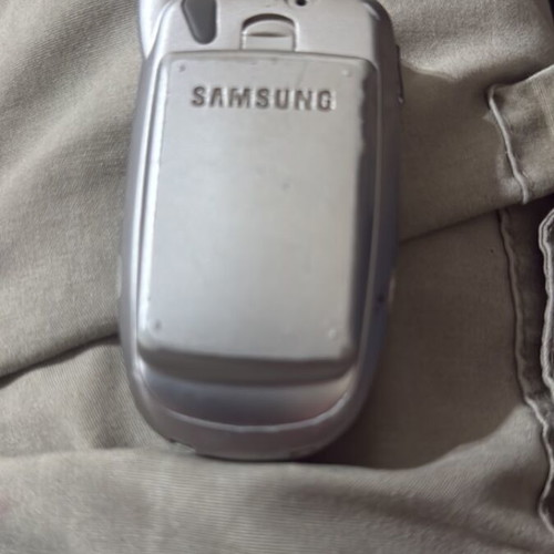 Samsung SGH-T100 flip phone used with cracked external screen