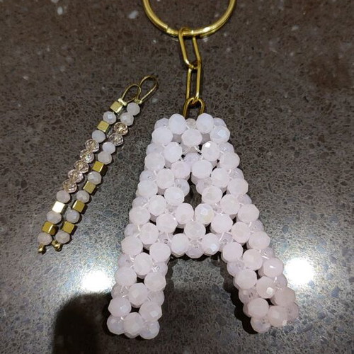 Beaded keychain like new, pink