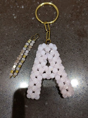 Beaded keychain like new, pink