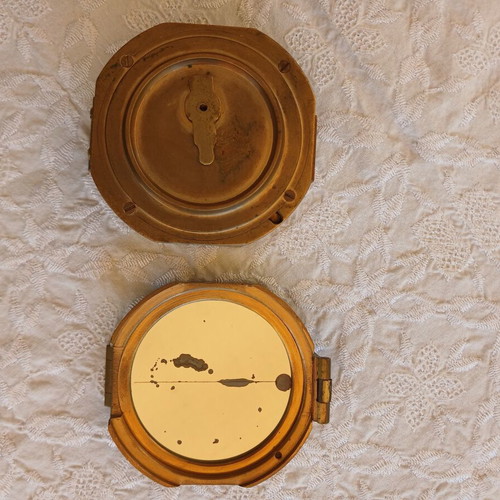 Vintage brass compass used with natural sine table