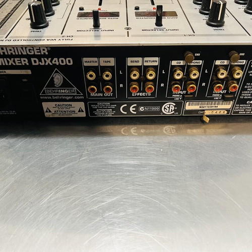 Behringer DJX400 DJ mixer used with 2 channels and BPM counters