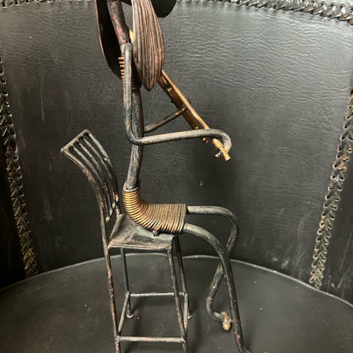 Abstract metal art cello player used