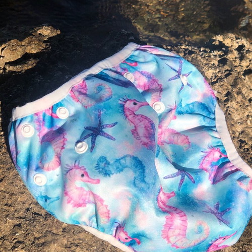 Swim diaper with seahorse and starfish pattern like new, multiple sizes