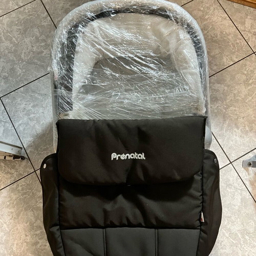 Prenatal stroller and carrycot used with mattress and winter cover