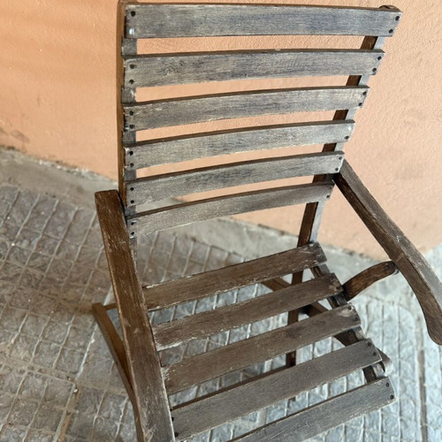 Wooden folding garden chair used with armrests