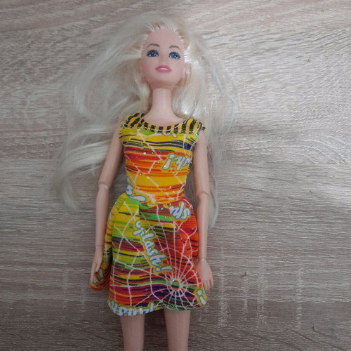Barbie doll used