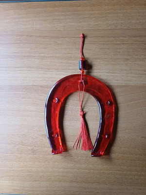 Handmade red glass horseshoe like new