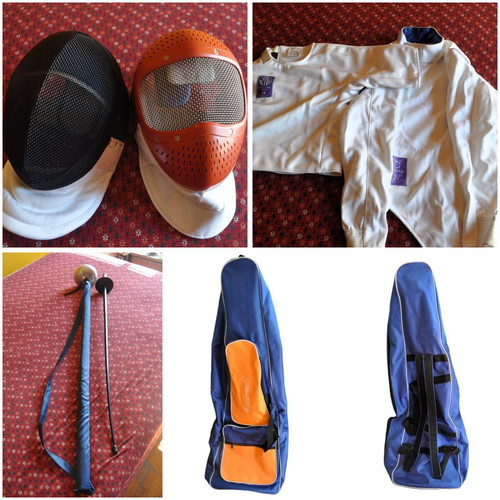 Fencing kit used with 2 swords, 2 helmets, bag and uniform
