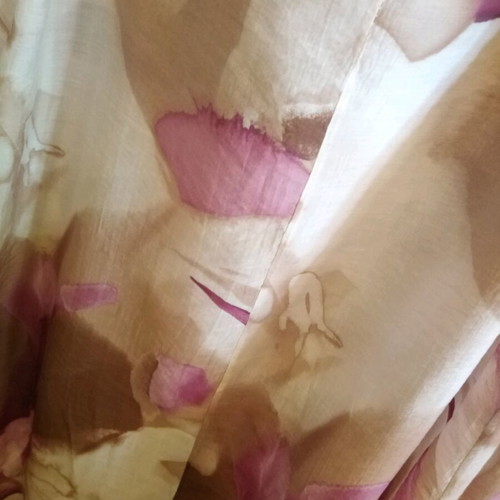Floral blouse airy like new, longer at the back