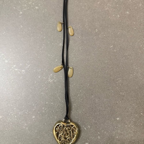 Long heart necklace with black cord like new, gold color
