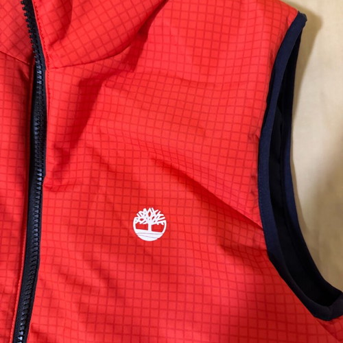 Timberland sleeveless reversible jacket new, orange and black