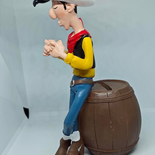 Lucky Luke collectible figure in barrel like new 19cm
