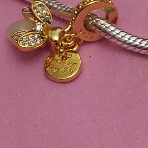 Charm bee pendant new with white and gold zirconia, glows in dark